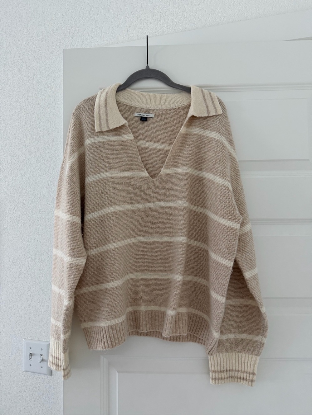 American Eagle Outfitters Beige and Cream Striped V‑Neck Sweater